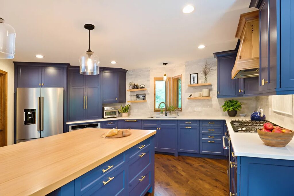 Refinished navy blue kitchen cabinets by a professional house painter in Lewis Center, OH