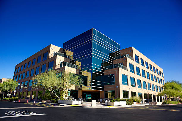 Fresh exterior paint finish on a modern commercial office building by a painter in Dublin, OH
