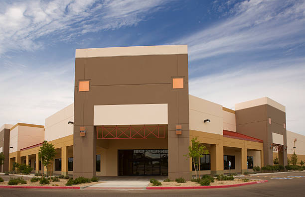 Retail building with modern beige and brown exterior and clean architectural finishes by an exterior painter in Powell, OH.