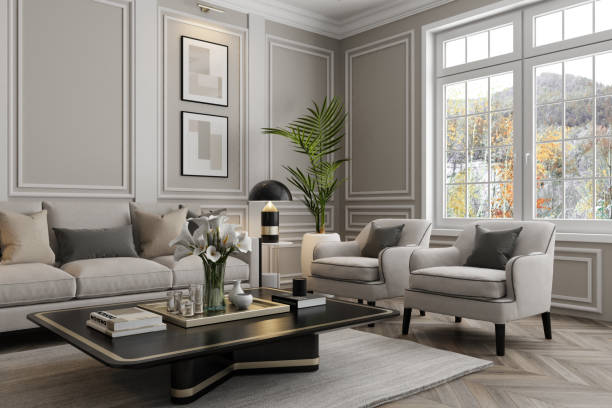 Living room with warm gray walls, white satin-finish trim and decorative wall molding by a house painter in Dublin, OH.