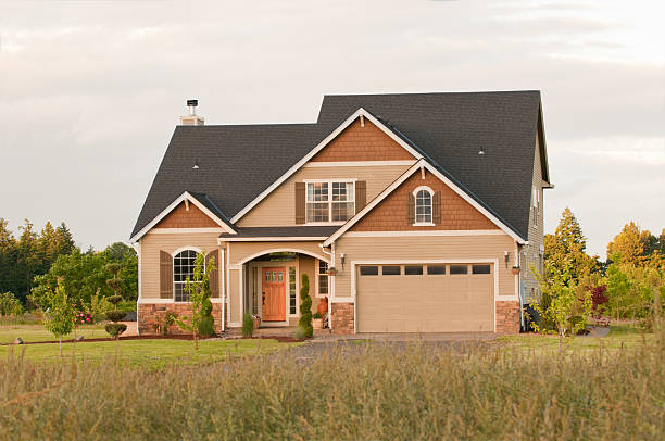 Warm taupe and terracotta home with cream trim by an exterior painter in Grove City, OH.